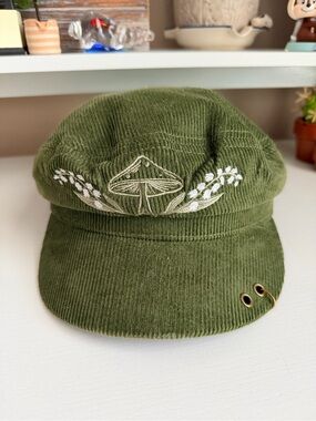 Hot Topic Lilly Of The Valley Mushroom Cabbie Hat